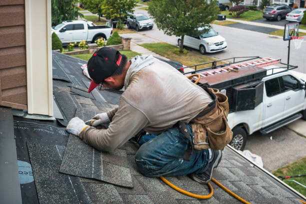 Professional Flat Roof Repair technician working in Patchogue, NY